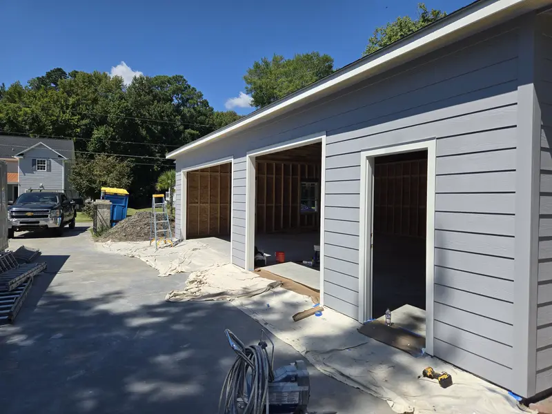 Front of the new detached garage with grey siding and white trim, Lake Waccamaw, NC