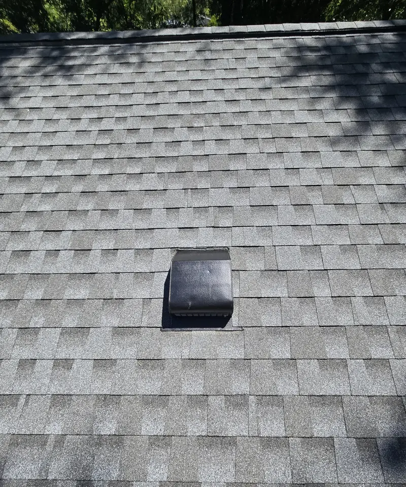 Black box roof vent set in new grey architectural shingles, Wilmington, NC
