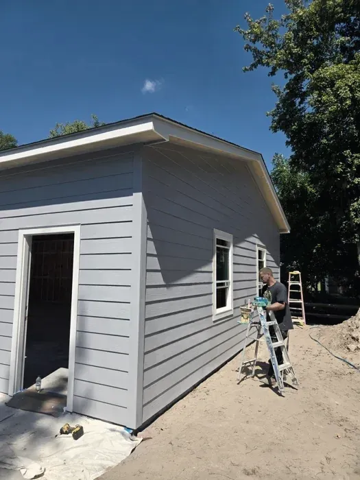 Finished trim and paint detail on a Howard Roofing exterior project in Wilmington NC